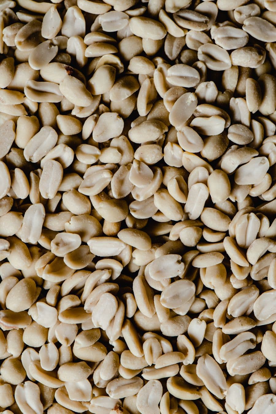 Close-up of blanched peanut kernels with the skin removed